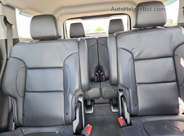 1GKKNML44PZ234717 2023 GMC ACADIA White Vista de los asientos traseros