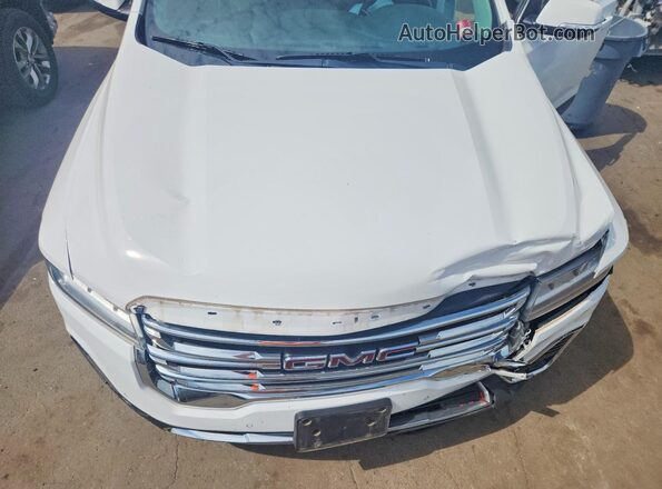 1GKKNRLS5MZ112701 2021 GMC ACADIA White Widok wnętrza z tyłu