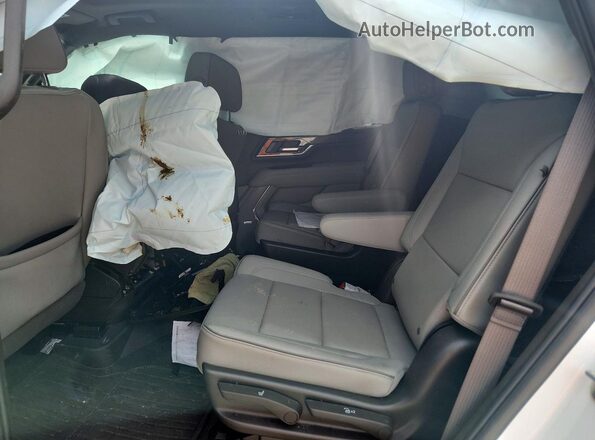 1GKS1BRD9SR381762 2025 GMC YUKON White Widok wnętrza z tyłu
