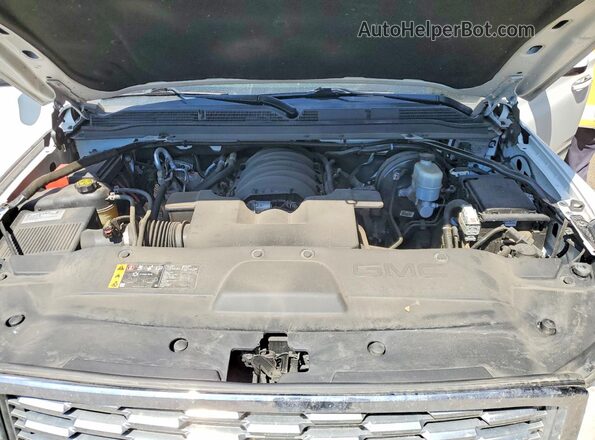 1GKS2CKJ5KR144561 2019 GMC YUKON Белый Вид задней части салона