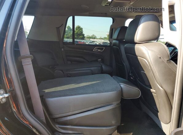 1GKS2CKJ9GR373977 2016 GMC YUKON Black Widok wnętrza z tyłu