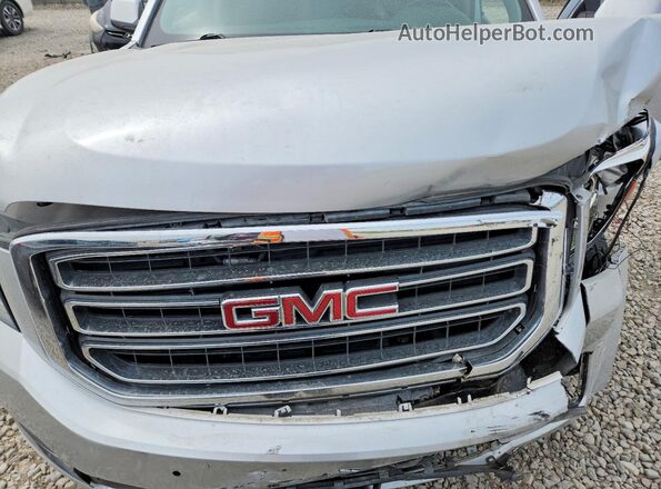 1GKS2FEC3JR395463 2018 GMC YUKON Silver Widok wnętrza z tyłu