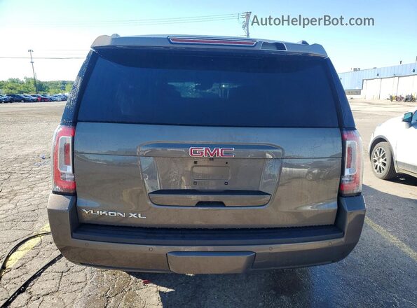 1GKS2GKC1GR107314 2016 GMC YUKON Gray უკანა ხედი
