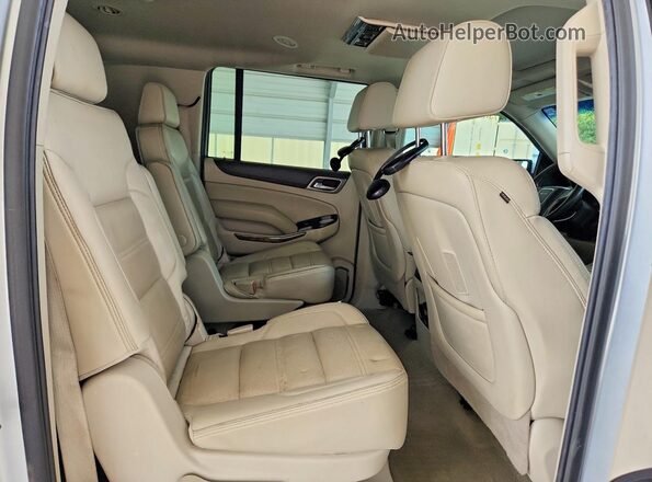 1GKS2HKJ7GR406049 2016 GMC YUKON Silver Rear interior view