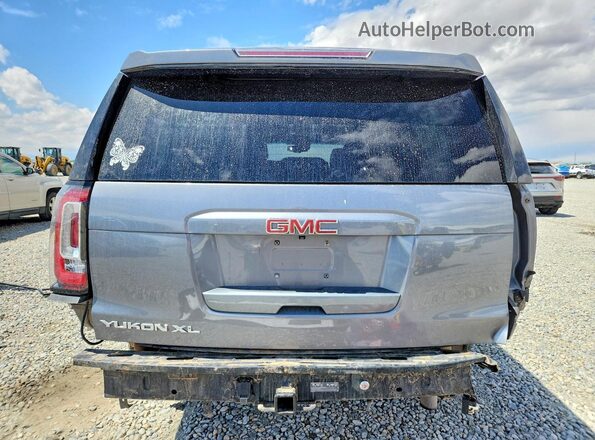 1GKS2JKC6KR215580 2019 GMC YUKON Gray Вид ззаду
