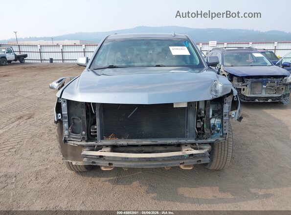 1GNSCAKCXJR363732 2018 CHEVROLET TAHOE Gray Widok wnętrza z tyłu
