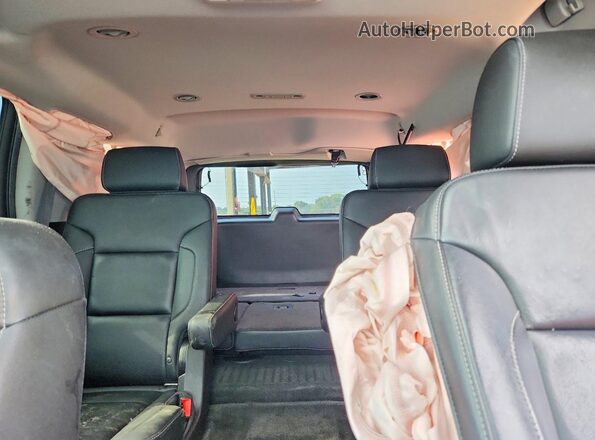 1GNSCBKC0JR274502 2018 CHEVROLET TAHOE Gray Vista de los asientos traseros