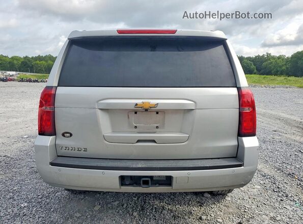 1GNSCBKC2KR409738 2019 CHEVROLET TAHOE Silver Vista trasera