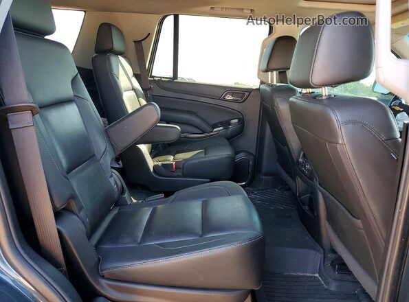 1GNSCBKC2LR133174 2020 CHEVROLET TAHOE Gray უკანა სალონის ხედი