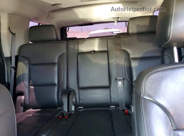 1GNSCBKC6JR119694 2018 CHEVROLET TAHOE Black Vista de los asientos traseros