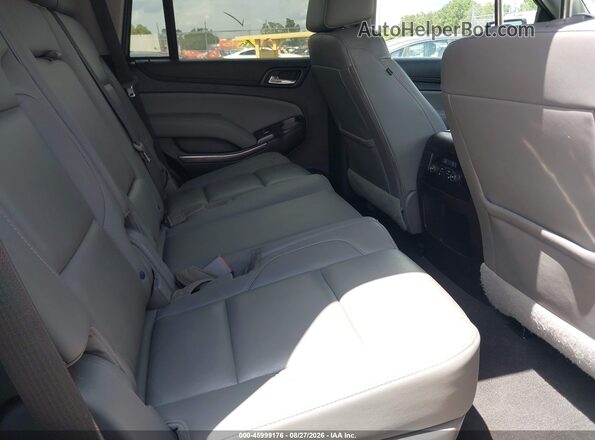 1GNSCBKCXKR257868 2019 CHEVROLET TAHOE White Вид наклейки з VIN-кодом