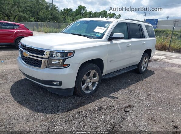 1GNSCBKCXKR257868 2019 CHEVROLET TAHOE White Передня ліва чверть