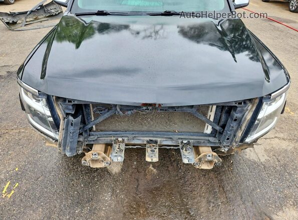 1GNSCCKC1GR406567 2016 CHEVROLET TAHOE Black Engine compartment view