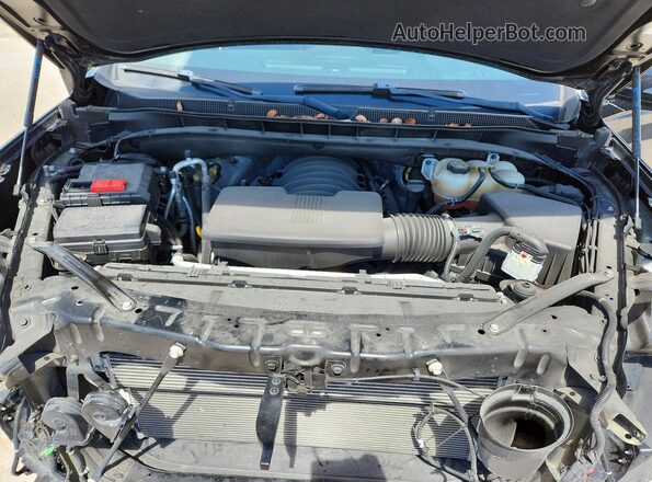 1GNSCCKD5PR506986 2023 CHEVROLET SUBURBAN Черный Вид задней части салона