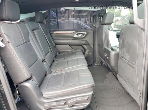 1GNSCEKD1PR336623 2023 CHEVROLET SUBURBAN Black Вид задньої частини салону