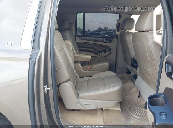 1GNSCHKC4GR106003 2016 CHEVROLET SUBURBAN Tan Вид наклейки з VIN-кодом