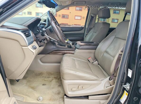 1GNSCHKC5JR143231 2018 CHEVROLET SUBURBAN Черный Вид салона спереди