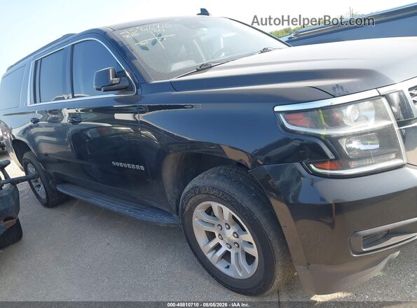 1GNSCHKC7JR106715 2018 CHEVROLET SUBURBAN Black Rear interior view