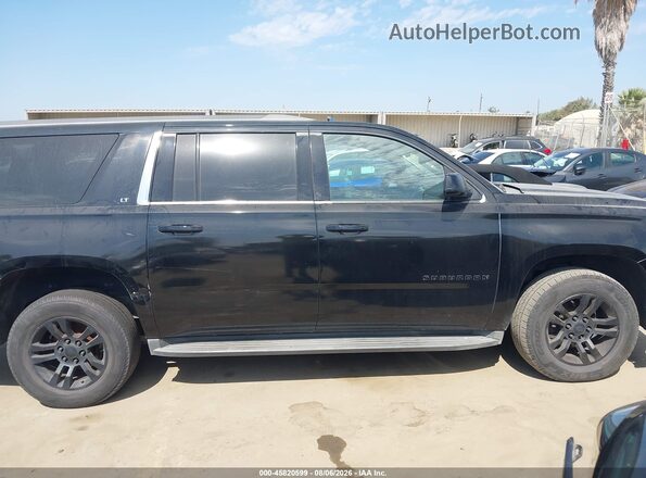 1GNSCHKC8GR403128 2016 CHEVROLET SUBURBAN Black Rear interior view