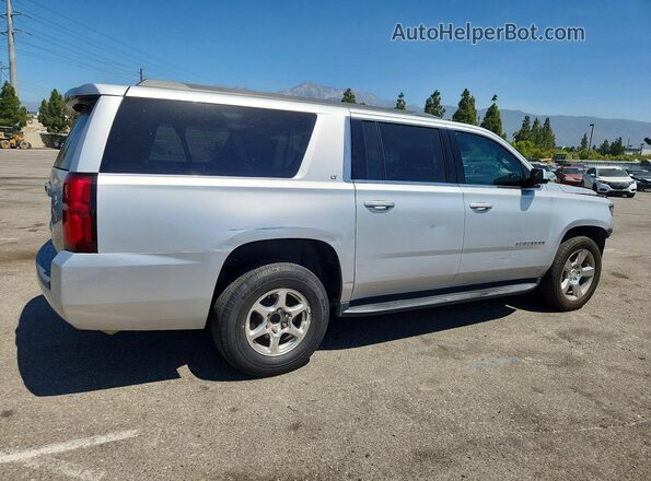 1GNSCHKC8KR302003 2019 CHEVROLET SUBURBAN Silver Trasero derecho