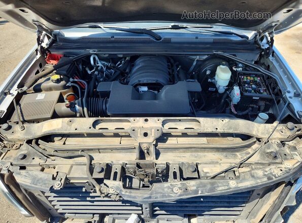 1GNSCHKC8KR302003 2019 CHEVROLET SUBURBAN Silver Vista del compartimento del motor