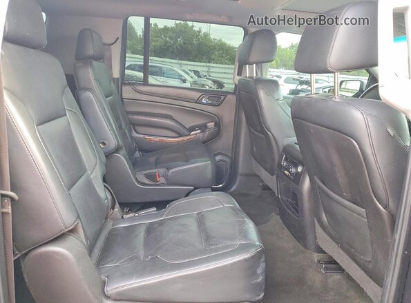 1GNSCJKC7GR329000 2016 CHEVROLET SUBURBAN Gray Vista interior trasera