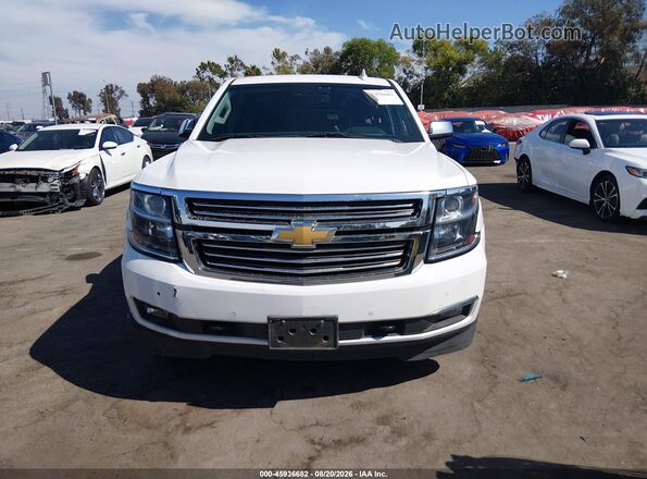 1GNSCJKC8JR101451 2018 CHEVROLET SUBURBAN White Widok wnętrza z tyłu