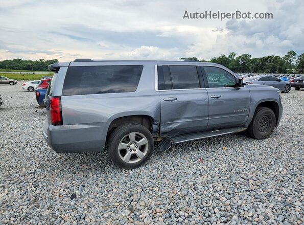 1GNSCJKC9LR218622 2020 CHEVROLET SUBURBAN Silver Trasero derecho