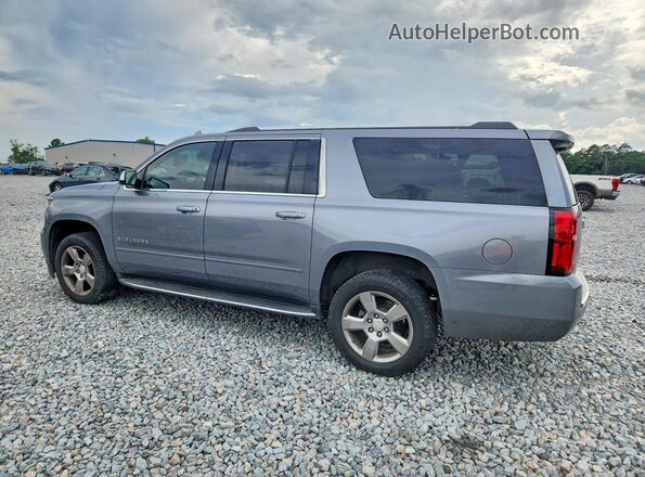 1GNSCJKC9LR218622 2020 CHEVROLET SUBURBAN Silver Trasero izquierdo