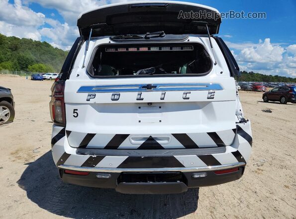 1GNSCLED0PR296504 2023 CHEVROLET TAHOE White Вид ззаду
