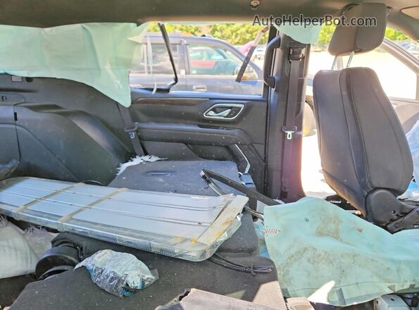 1GNSCLED0PR296504 2023 CHEVROLET TAHOE White Вид задньої частини салону