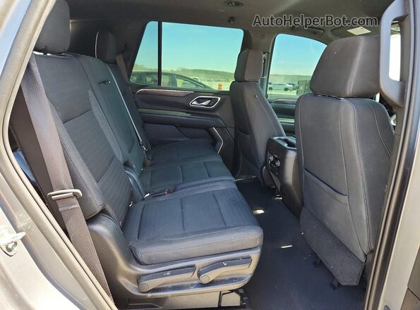 1GNSCMKD9MR295289 2021 CHEVROLET TAHOE Gray Widok wnętrza z tyłu