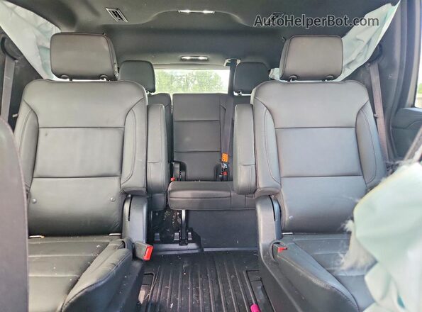 1GNSCNKD4NR130855 2022 CHEVROLET TAHOE Black Widok tylnych siedzeń