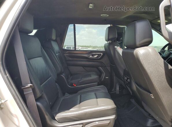 1GNSCNKD4PR222390 2023 CHEVROLET TAHOE Silver Rear interior view