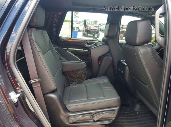 1GNSCRKD0RR285271 2024 CHEVROLET TAHOE Черный Вид задней части салона