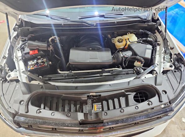 1GNSCRKDXNR213018 2022 CHEVROLET TAHOE Белый Вид подкапотного пространства