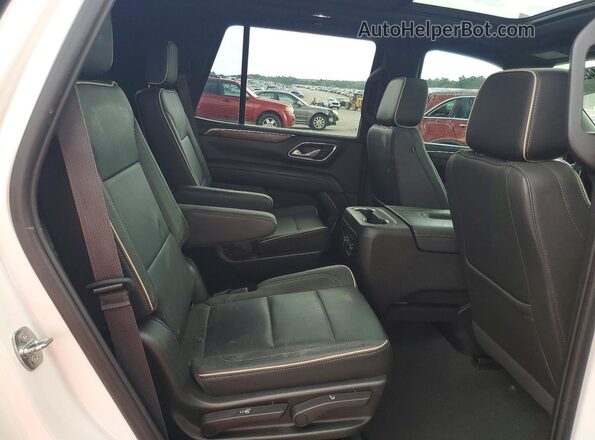 1GNSCSKD5PR144684 2023 CHEVROLET TAHOE Белый Вид задней части салона