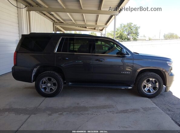 1GNSKAEC1JR326910 2018 CHEVROLET TAHOE Gray Vista interior trasera