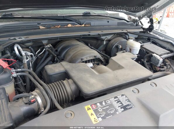 1GNSKAEC1KR348357 2019 CHEVROLET TAHOE Серебряный Вид сзади