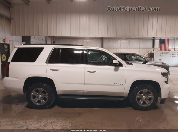 1GNSKAEC3JR352182 2018 CHEVROLET TAHOE White Widok wnętrza z tyłu