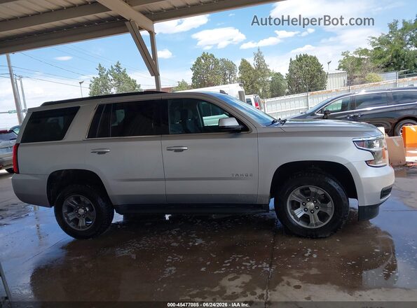 1GNSKAEC3KR331544 2019 CHEVROLET TAHOE Silver Widok wnętrza z tyłu