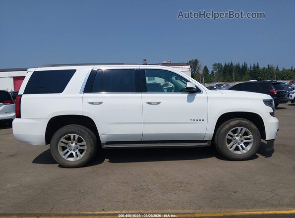 1GNSKAEC7HR329143 2017 CHEVROLET TAHOE White Rear interior view