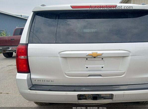 1GNSKAEC7JR296182 2018 CHEVROLET TAHOE Silver Vista interior trasera
