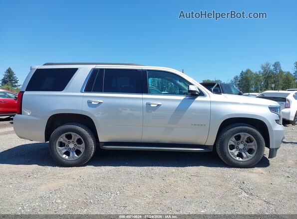 1GNSKAEC8JR328508 2018 CHEVROLET TAHOE Silver Widok wnętrza z tyłu