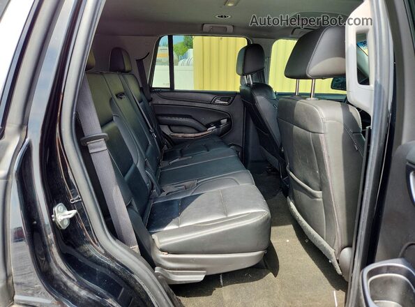 1GNSKBKC1JR133201 2018 CHEVROLET TAHOE Black Widok wnętrza z tyłu
