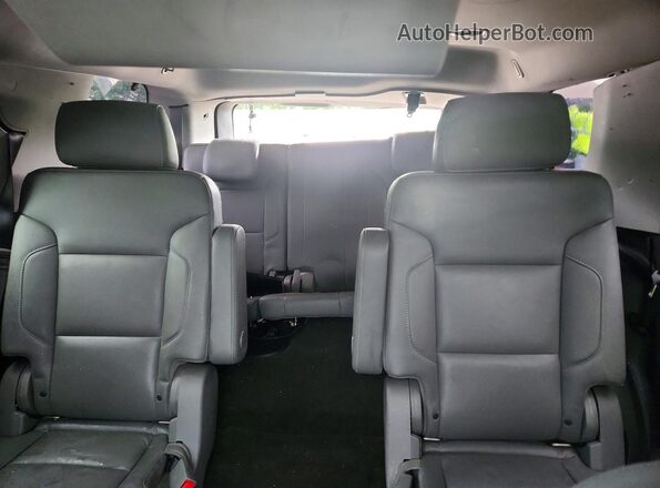 1GNSKBKC3JR250424 2018 CHEVROLET TAHOE Black Widok tylnych siedzeń