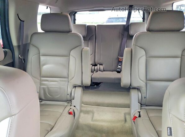 1GNSKBKC3JR345582 2018 CHEVROLET TAHOE Black Vista de los asientos traseros