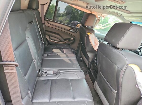 1GNSKBKC5JR244690 2018 CHEVROLET TAHOE Black Սալոնի հետևի տեսք