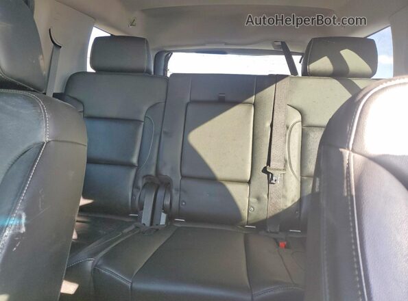 1GNSKBKC7JR331894 2018 CHEVROLET TAHOE Black Vista de los asientos traseros