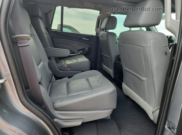 1GNSKBKC8KR291858 2019 CHEVROLET TAHOE Gray Vista interior trasera